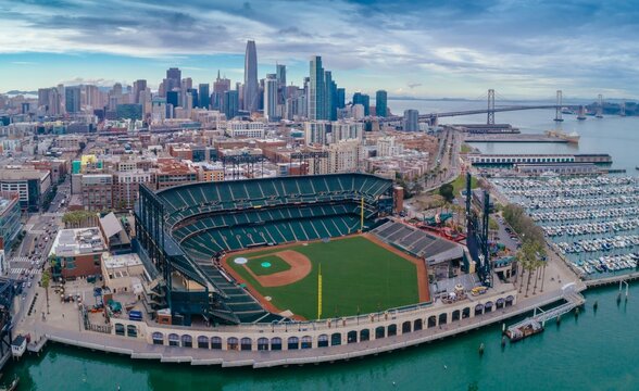 Aerial view of Oracle Park, home of the San Francisco Giants baseball team, with the city skyline and Bay Bridge in the background,, San Francisco, California, USA. 11 Marh 2025
