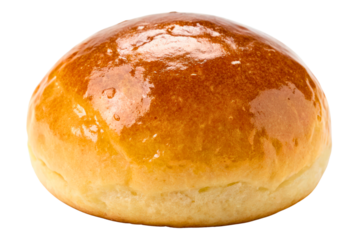 Delicious freshly baked brioche bun with a shiny golden top isolated with transparent background