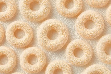 Close-up view of delicious, round, and frosted cereal rings, artfully arranged, presenting a delightful treat