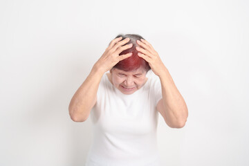 Elderly Woman having headache and Dizzy for concepts of Chronic Stress, Headache and Migraine,...