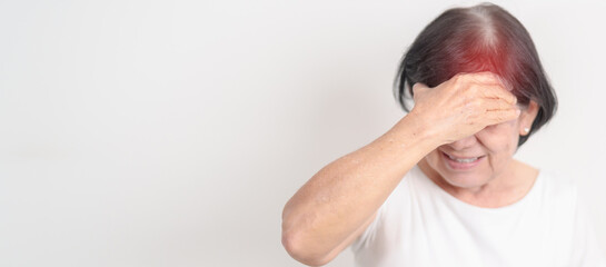 Elderly Woman having headache and Dizzy for concepts of Chronic Stress, Headache and Migraine,...