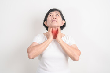elderly Woman checking Thyroid gland disease. Hand holding Neck pain and Sore Throat....