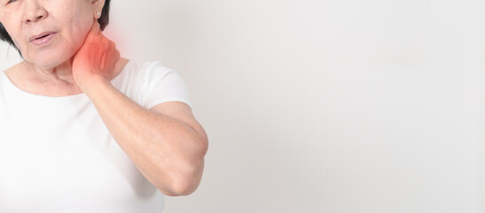 Elderly Woman having Neck pain for concepts of Neck Muscle Strain and Inflammation, Myofascial pain...