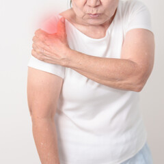 Elderly Woman having Shoulder Pain for Muscle Inflammation and Sprain, Myofascial ache syndrome and...