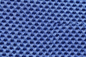 A detailed image of a blue mesh textile, showing the intricate pattern of the material. The texture is smooth and provides a good close-up of the textile details