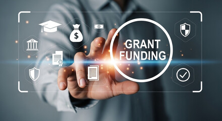 Man touching grant funding interface with icons of education and finance on a digital screen