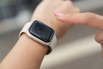 Smartwatch Fitness Tracking. Close-up of a woman checking her smartwatch.