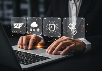 Person using laptop with SAP icon on virtual screen for business process automation software and management software, SAP or ERP enterprise resources planning system concept.