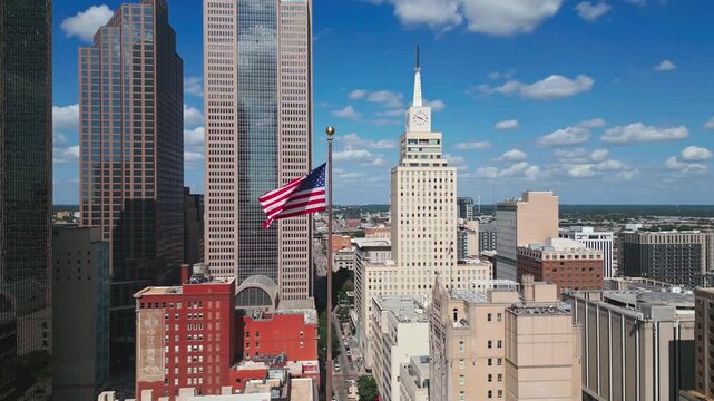 Aerial of US Flag and Interior Dallas Skyline