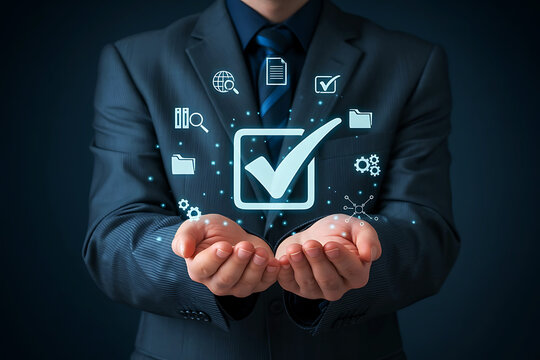 Businessman holding glowing icons representing digital services and successful task completion