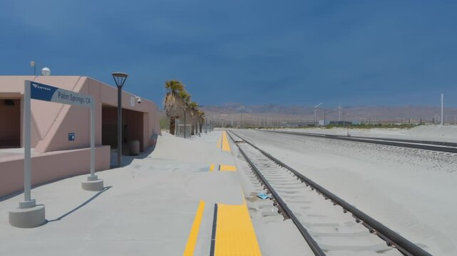 Palm Springs Train Station with piles of drifting sand