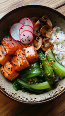Salmon bowl with colorful vegetables and rice