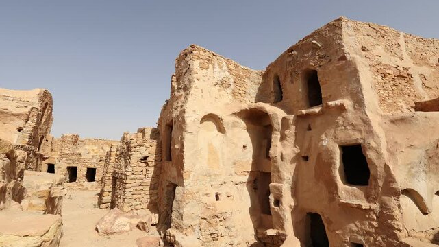 Ruins of ghorfas in ancient Ksar Beni Barka Berber settlement, Tataouine, Tunisia