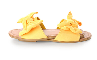 Yellow female flip flops on white background