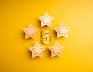 Shiny golden number five icon surround with 5 wooden stars ratings, yellow background. Five stars Excellence quality, satisfaction, customer evaluation, successful mission business marketing concept.