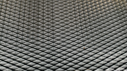 Close-up of welded wire mesh panels used in construction for concrete reinforcement and fencing applications.