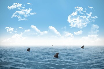 Shark infested sea under blue sky