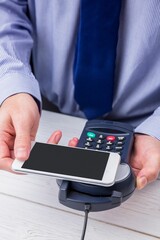 Man using smartphone to express pay