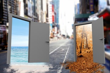 Open doors in city with sea and trees