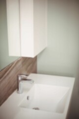 Faucet and sink in modern bathroom