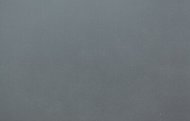 Grey textured surface is covering entire canvas in flat design, showing subtle shade variations