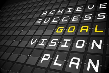 Goal buzzwords on black mechanical board
