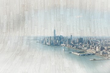 Displaying aerial city skyline in flat design, showing skyscrapers, piers, docked boats, calm water