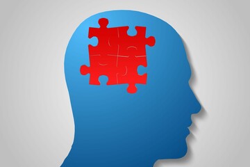 Digitally generated Red jigsaw on blue head