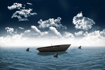 Sharks circling small boat in the sea