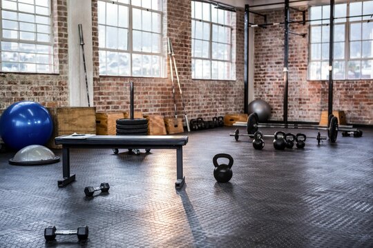 Flat bench is being positioned in flat design gym interior with brick walls, city view, weights
