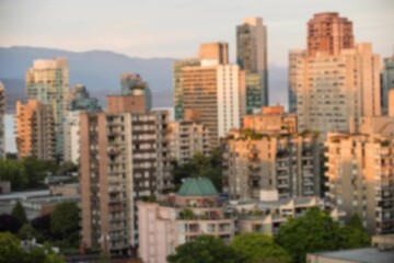 Blurry view of cityscape during summer