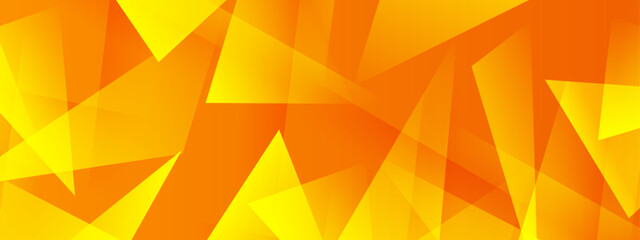 Overlapping dynamic orange and yellow triangles, vibrant design for backgrounds, banners, geometric patterns, wallpaper, or abstract concepts.