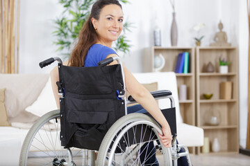 a confident woman with a wheelchair