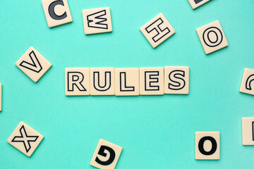Word RULES with letters on turquoise background