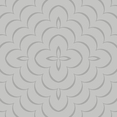 A symmetrical pattern features overlapping floral shapes and geometric motifs in a monochromatic color scheme. The design is intricate, with a repetitive arrangement creating a sense of harmony.