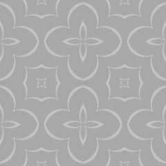 A seamless geometric pattern features interlocking floral shapes with soft curves and pointed edges in shades of gray. The symmetrical design creates a repeating, harmonious motif.