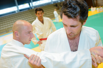 Obraz premium battle of two fighters judo sports judo competitions