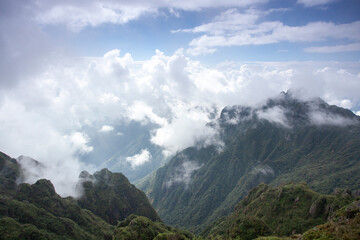 Landscape of Morning Mist with Mountain Layer. mountain ridge and clouds in rural jungle bush forest