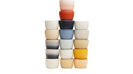 Stack of Ceramic Cups in Descending Size Order on White Background