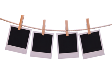 Blank Memories, Vintage Polaroids Waiting to Be Filled, Four Polaroids Hung with Promise, isolated on transparent background. PNG file, cut out