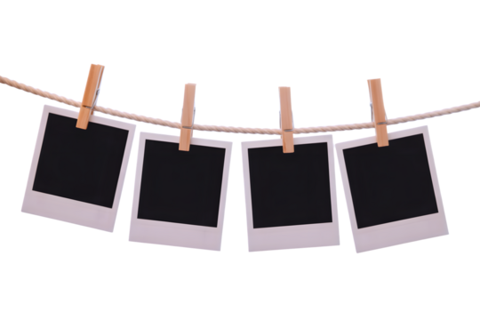 Blank Memories, Vintage Polaroids Waiting to Be Filled, Four Polaroids Hung with Promise, isolated on transparent background. PNG file, cut out