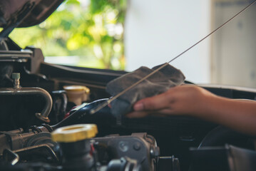 Close up Man hands fixing Car machinery vehicle mechanical service. Mechanic man hands repairing...