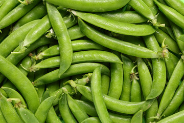 Texture of fresh green peas as background