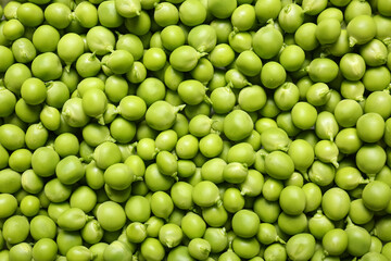 Texture of fresh green peas as background