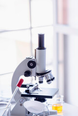 Vertical Horizon Science laboratory chemistry test science lab with microscope glass tubes on white...