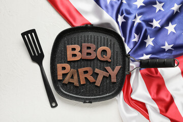 USA flag, words BBQ PARTY made of wooden letters and barbecue utensils on white grunge background....