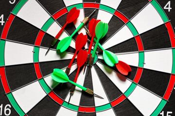 Board with darts, closeup view