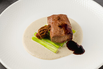 Tender beef medallion served with morel mushrooms and creamy sauce