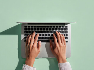Close-up, hands typing on laptop keyboard, laptop mockup, green background, flat lay view, minimalist style, high-resolution photography, detailed, isolated, pastel color background, st - AI-Generated