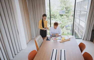 group of business people LGBTQ+ Diverse Team meeting collaborating new project in office